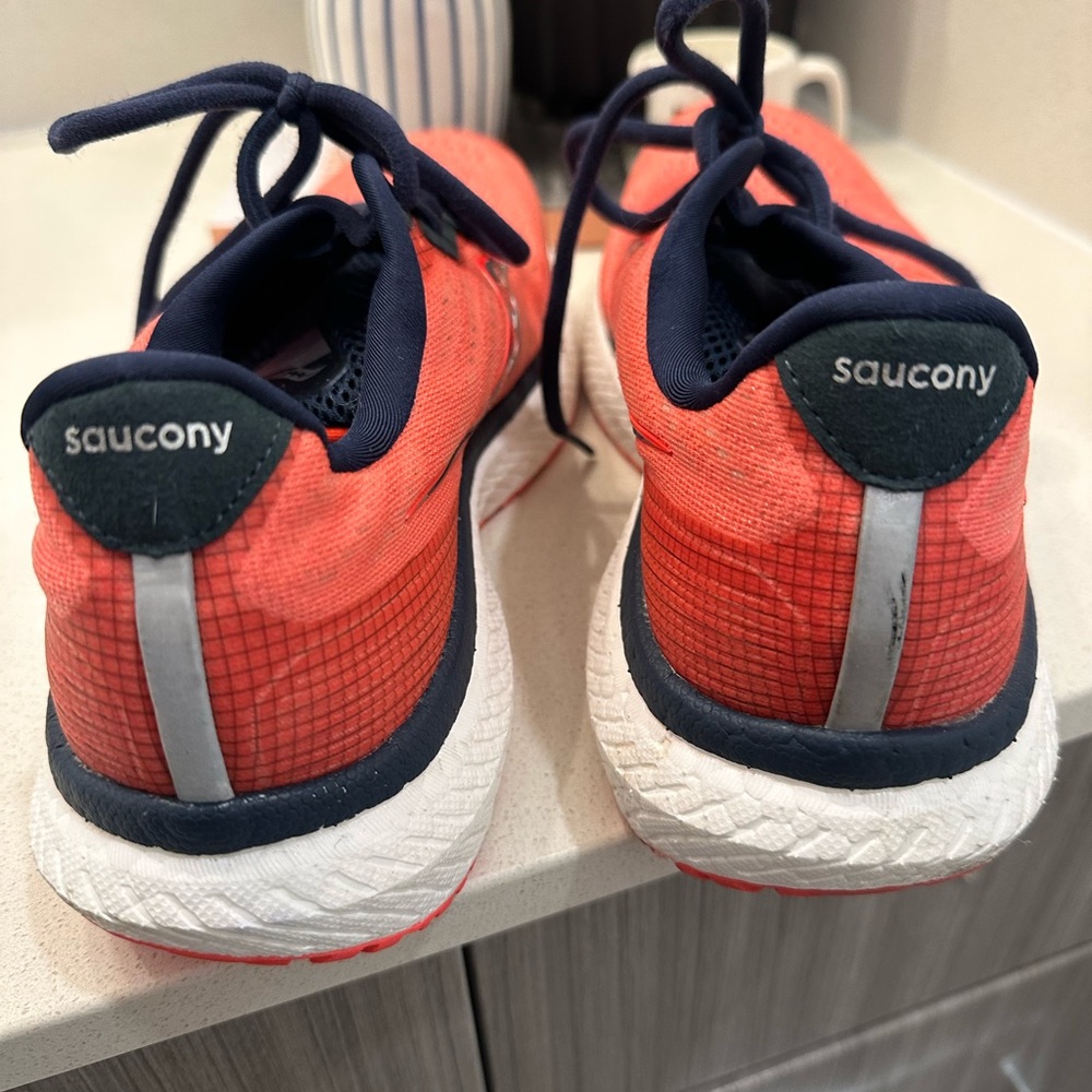 Orange saucony sneakers never worn